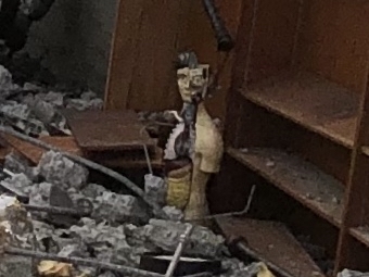 Science dummy in rubble 