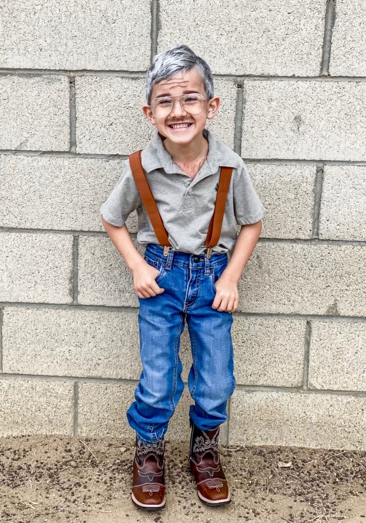 Picture of young boy dressed as old man